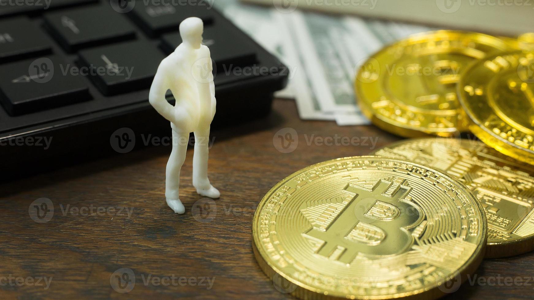 white miniature and gold coin bitcoin abstract image close up background. photo