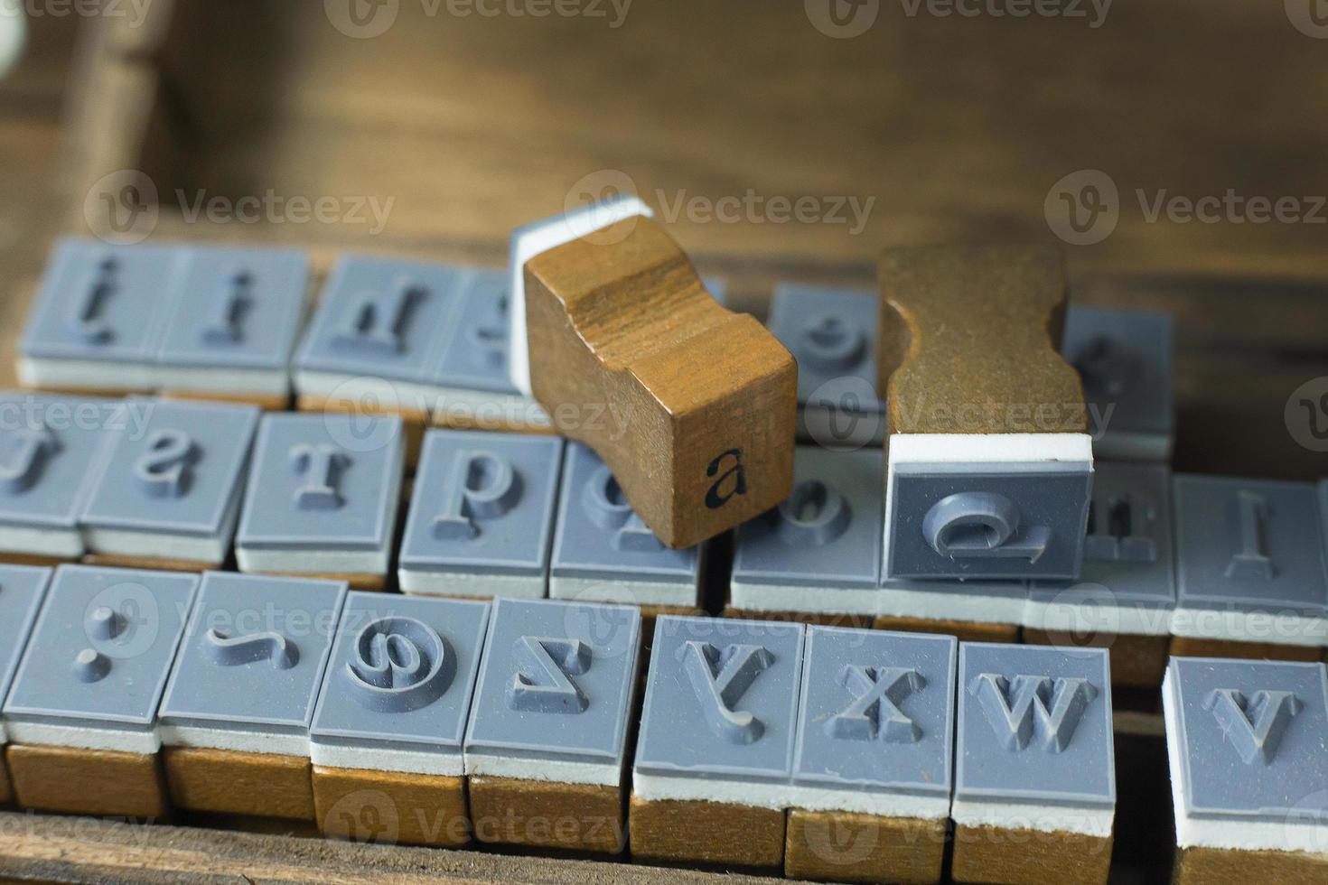 wood stamp alphabet close up image for background. photo