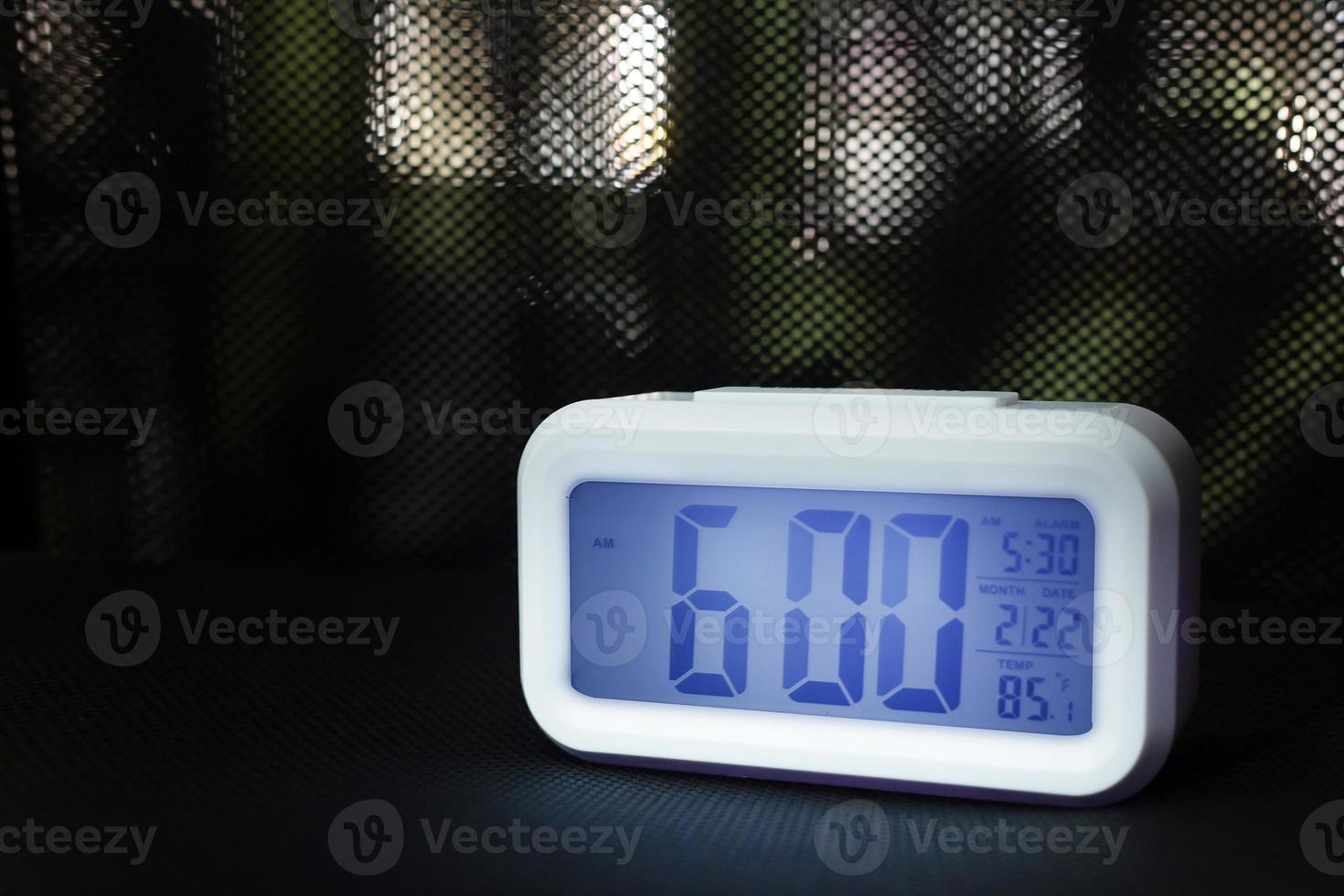 Digital alarm clock  6am close up image. photo