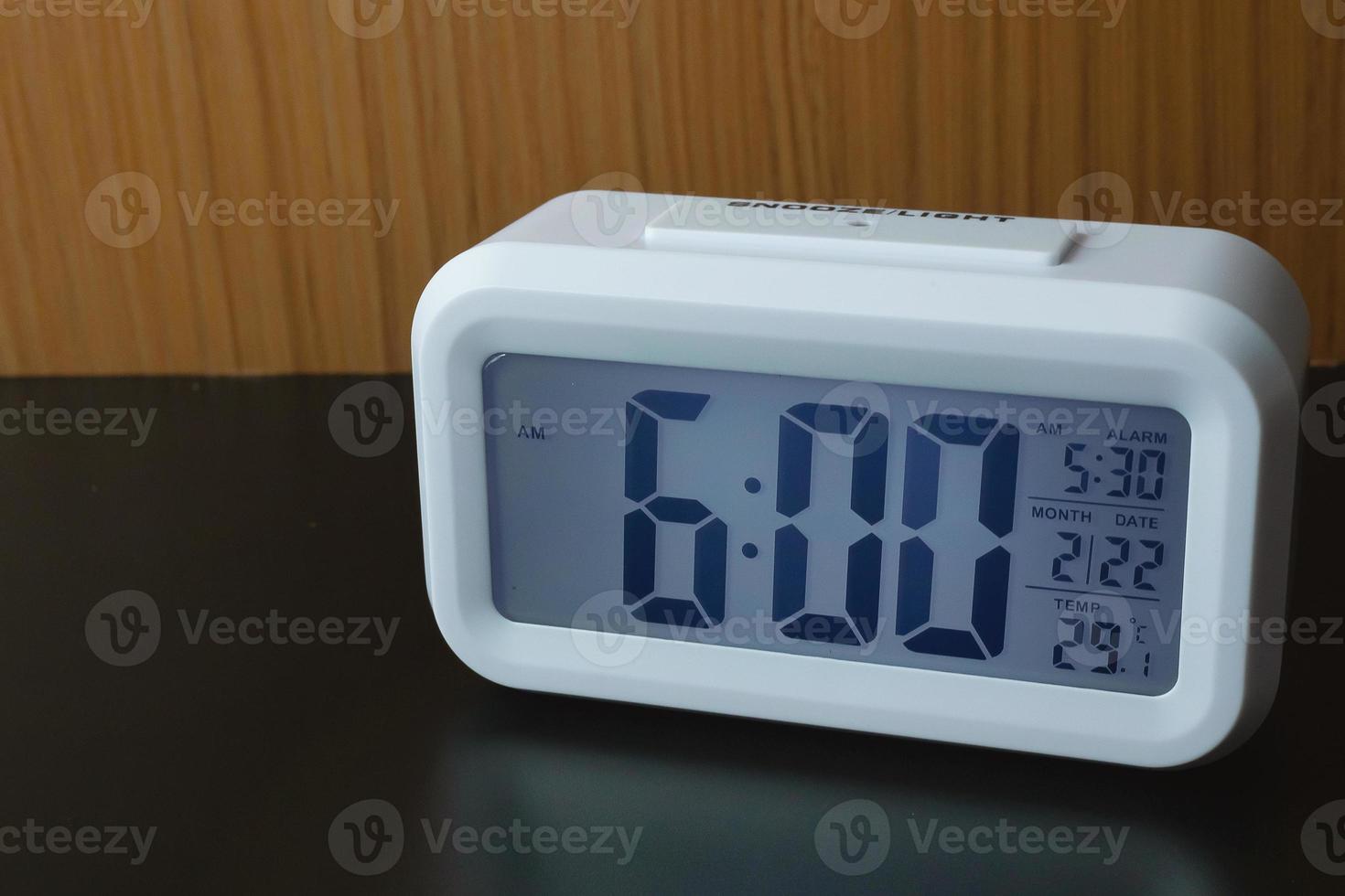 Digital alarm clock  6am close up image. photo