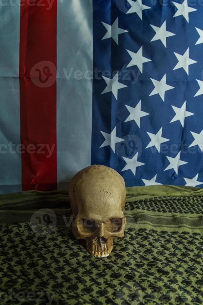 The  united states of America flag and Shemagh  and skull abstract background. photo