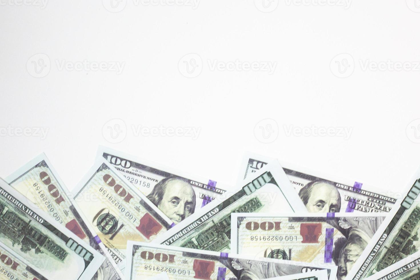 The  Close up 100 dollar banknote on white background for  business content. photo