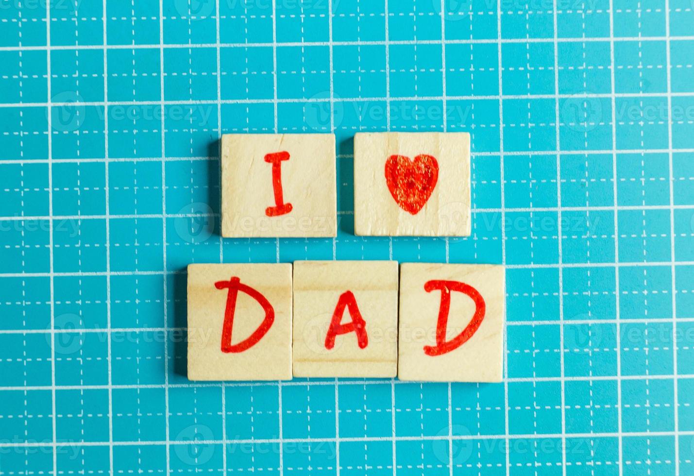 alphabet on small plate on Blue background  for Father  day image photo