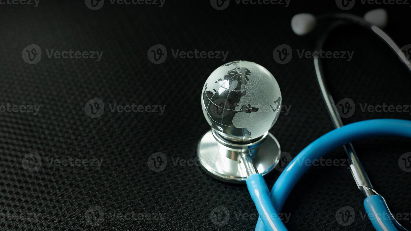 stethoscopes on black background image close up photo