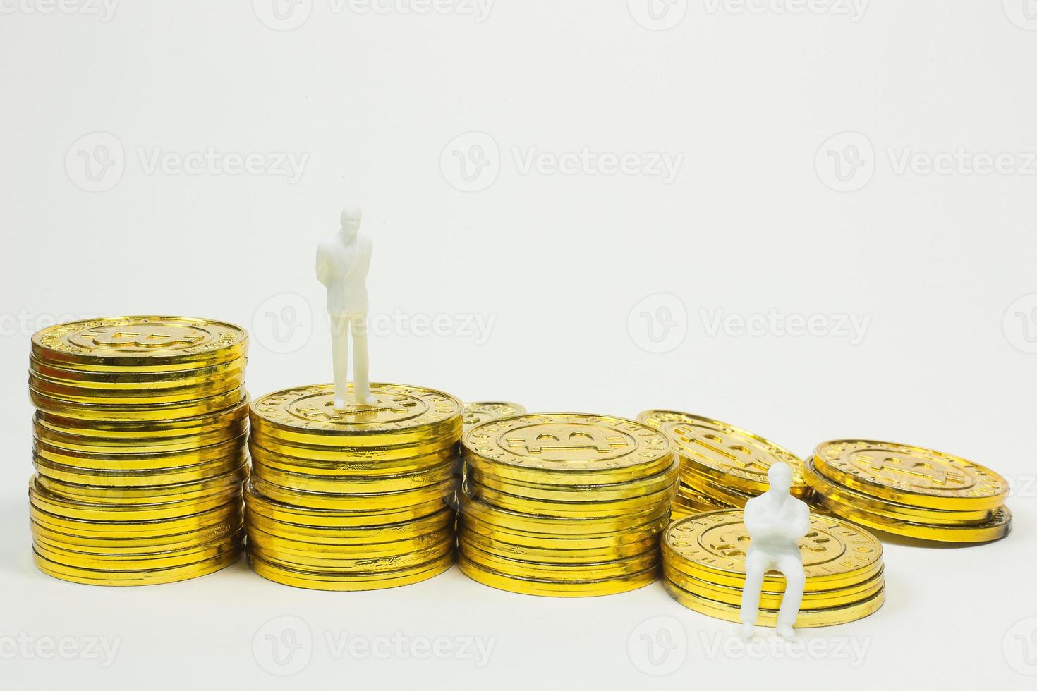white miniature and gold coin bitcoin abstract image close up background. photo