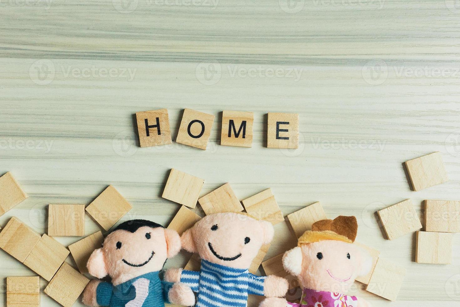 Home word on wood plate abstract background. photo