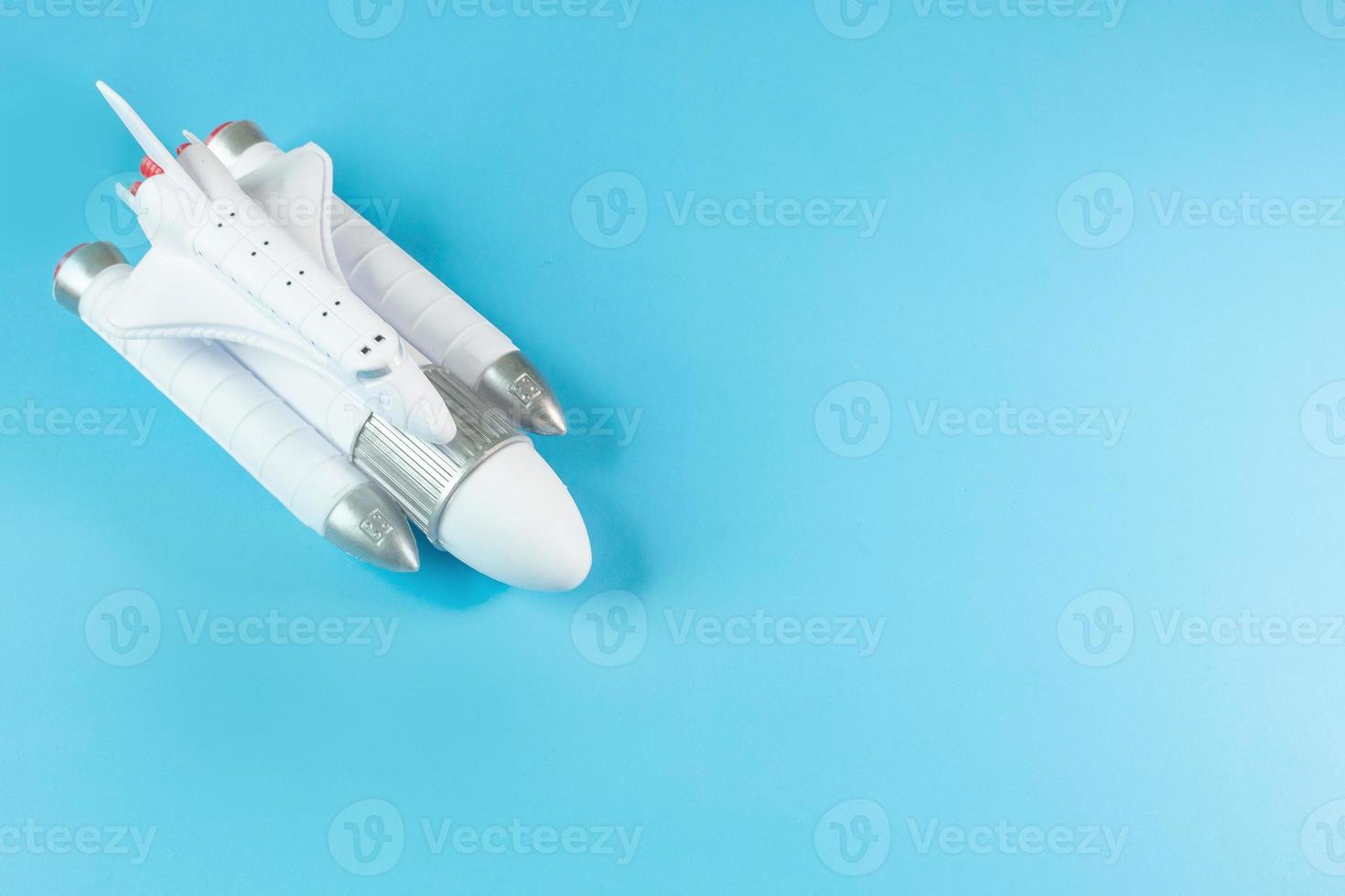 The  close up image space ship on blue background. photo
