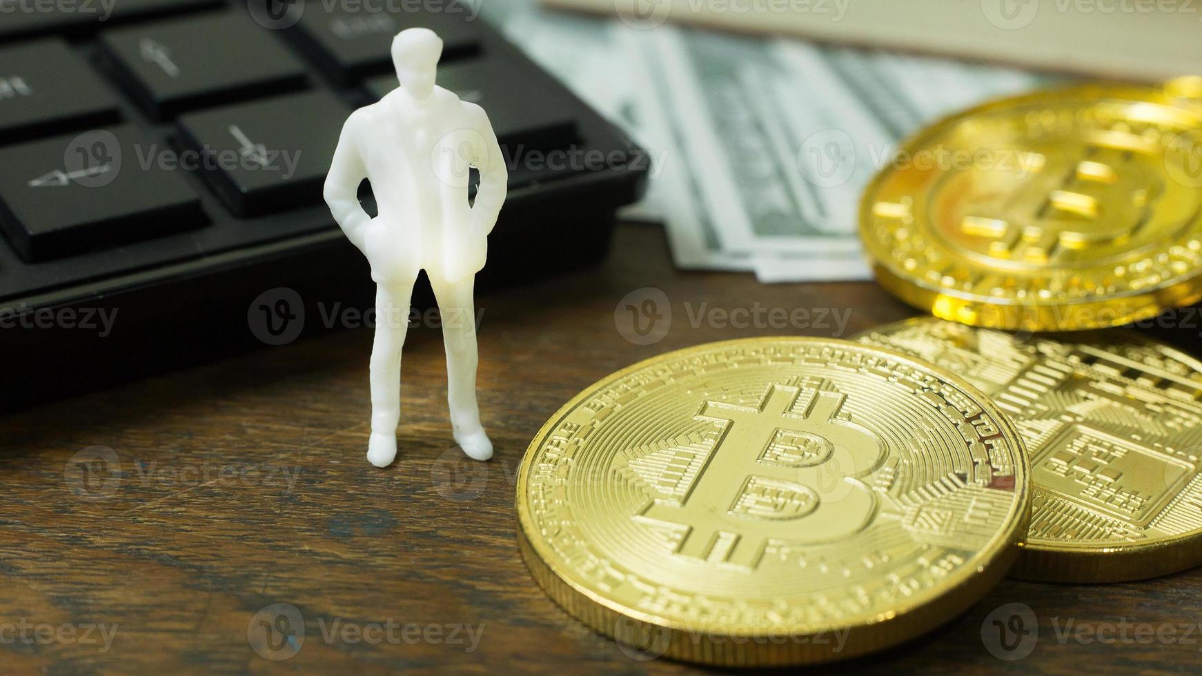 white miniature and gold coin bitcoin abstract image close up background. photo