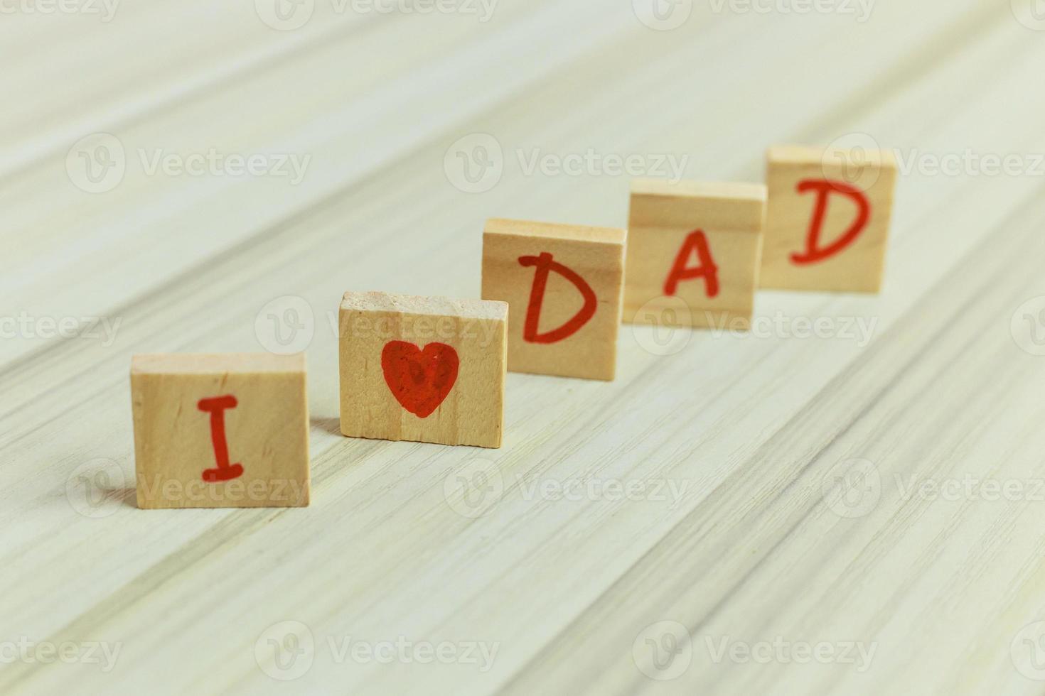 alphabet on small plate on wood table for Father  day image. photo