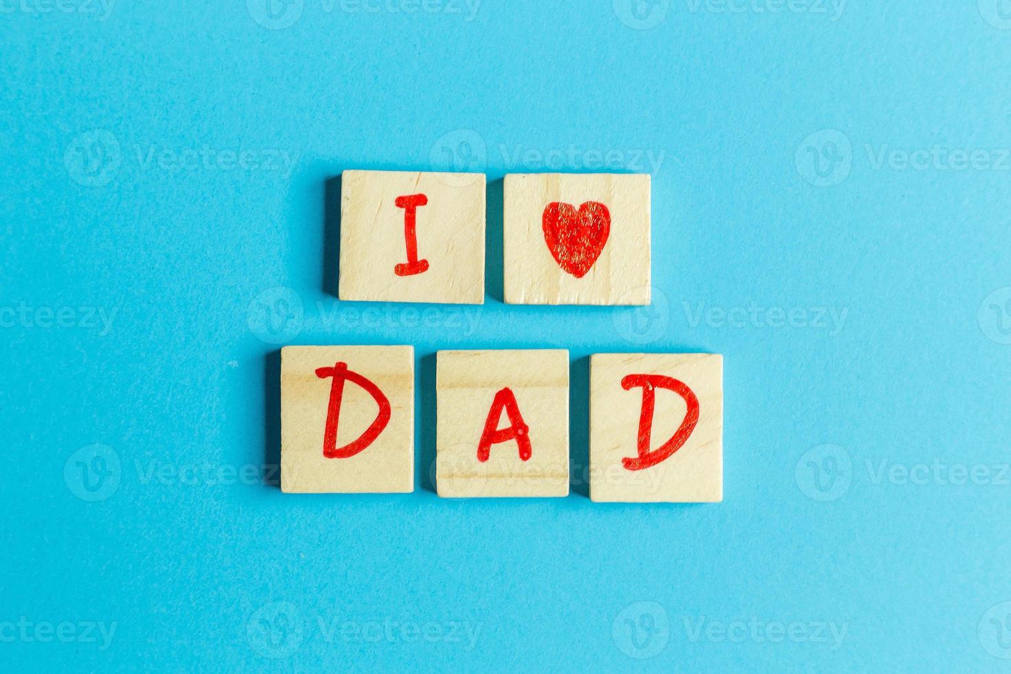 alphabet on small plate on Blue background  for Father  day image photo