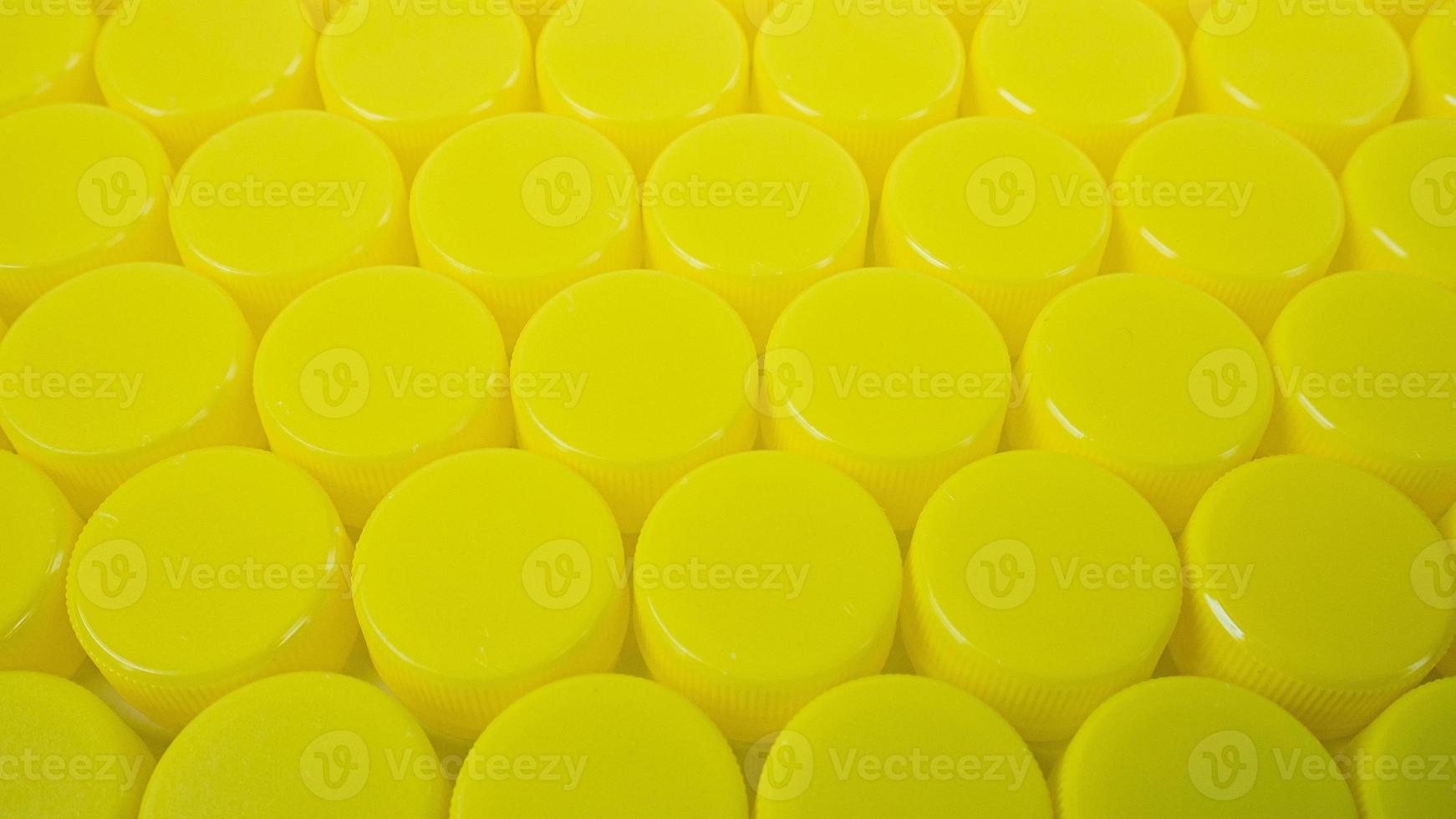 yellow Bottle  plastic cap for ego background. photo