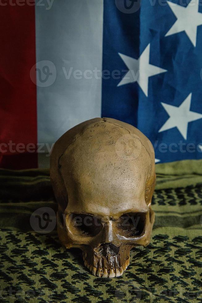 The  united states of America flag and Shemagh  and skull abstract background. photo