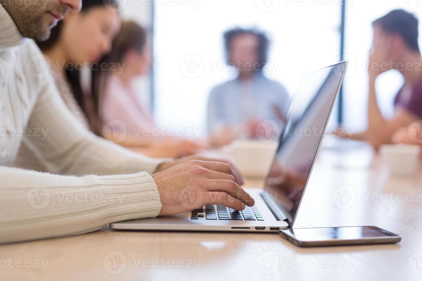 Startup Business Team At A Meeting at modern office building photo