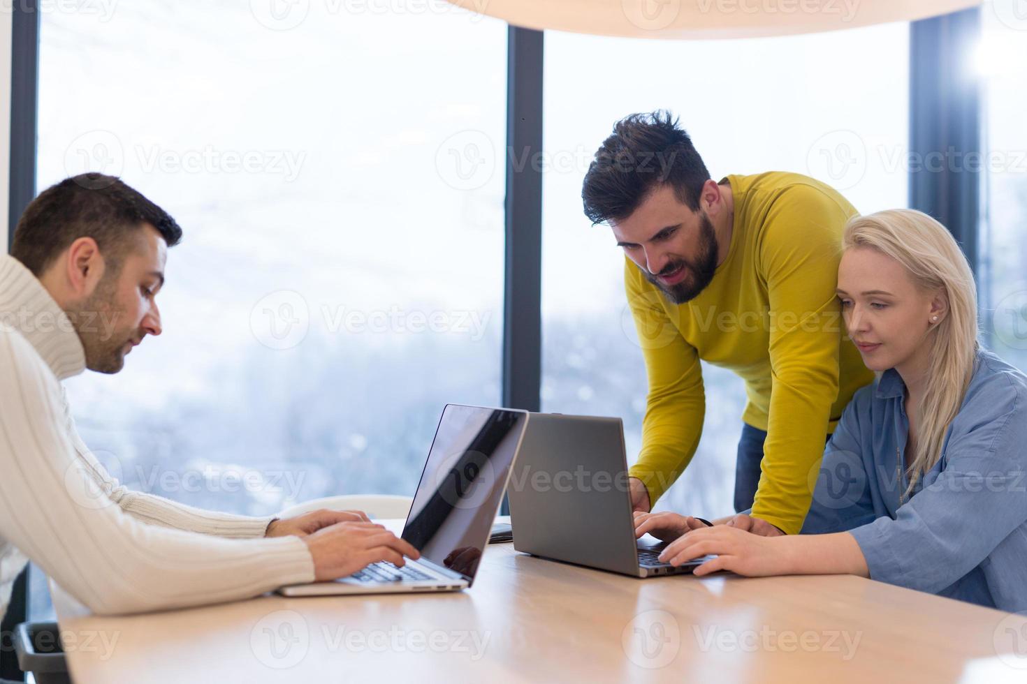 Startup Business Team At A Meeting at modern office building photo