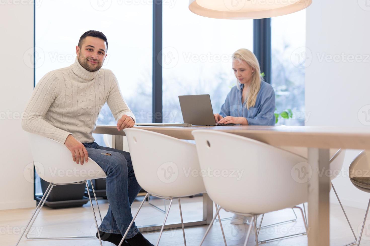 Startup Business Team At A Meeting at modern office building photo