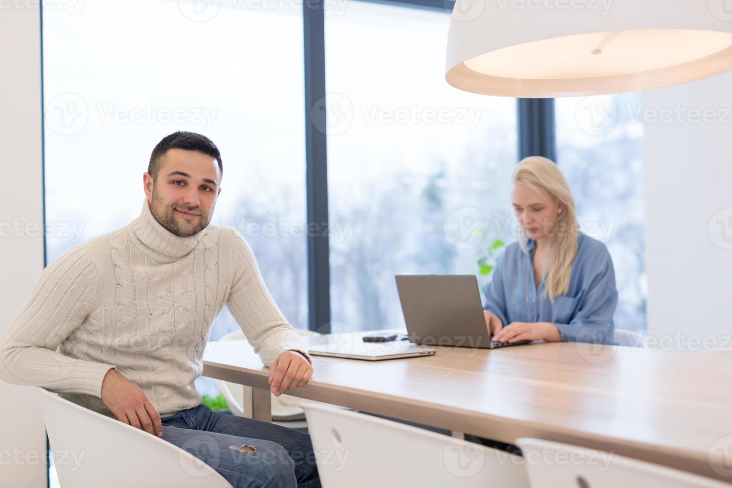 Startup Business Team At A Meeting at modern office building photo