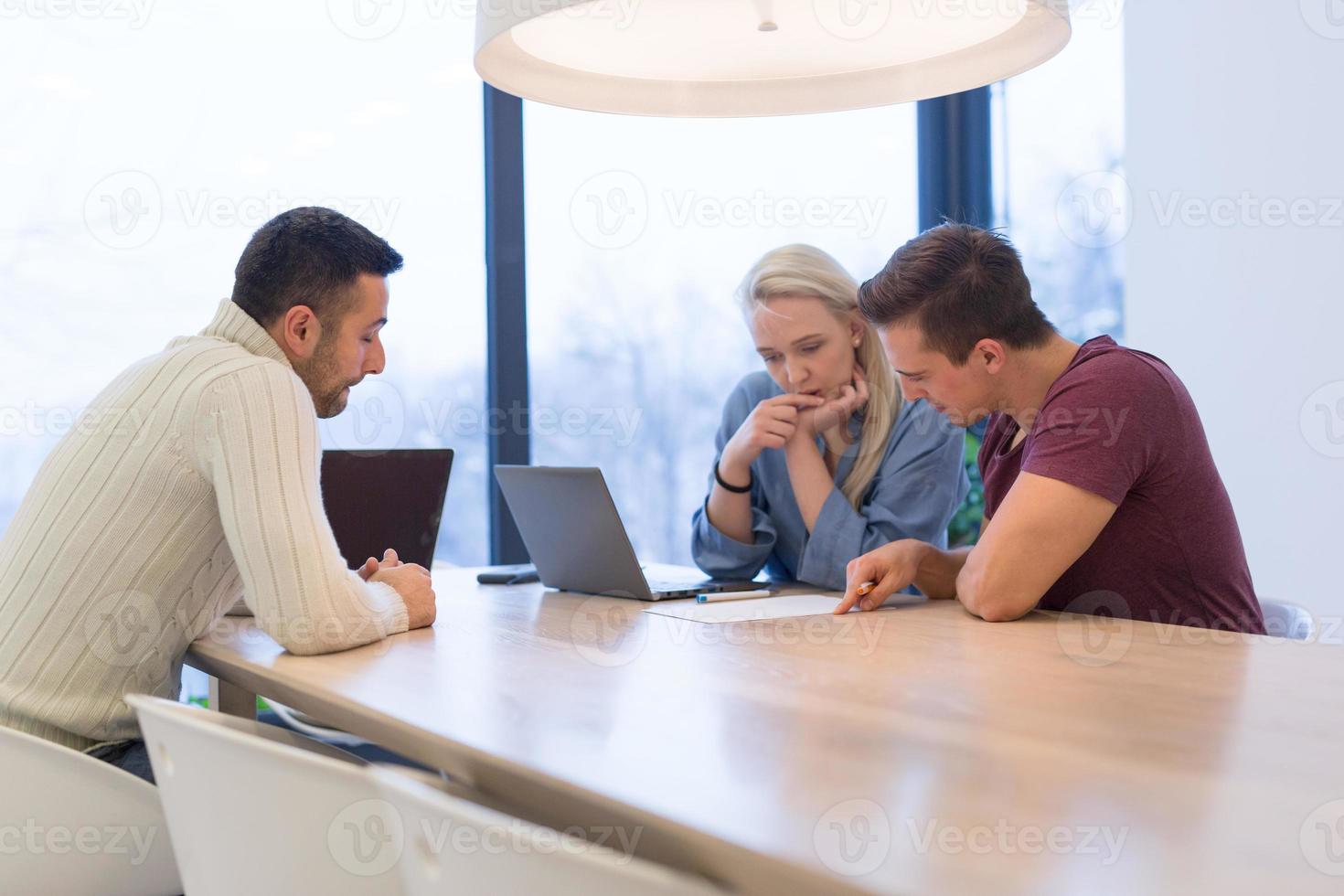 Startup Business Team At A Meeting at modern office building photo