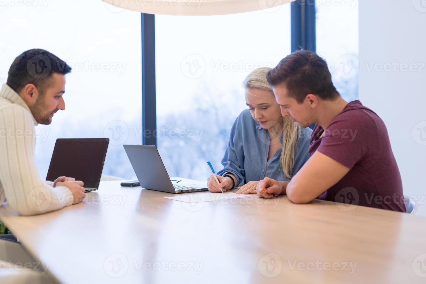 Startup Business Team At A Meeting at modern office building photo