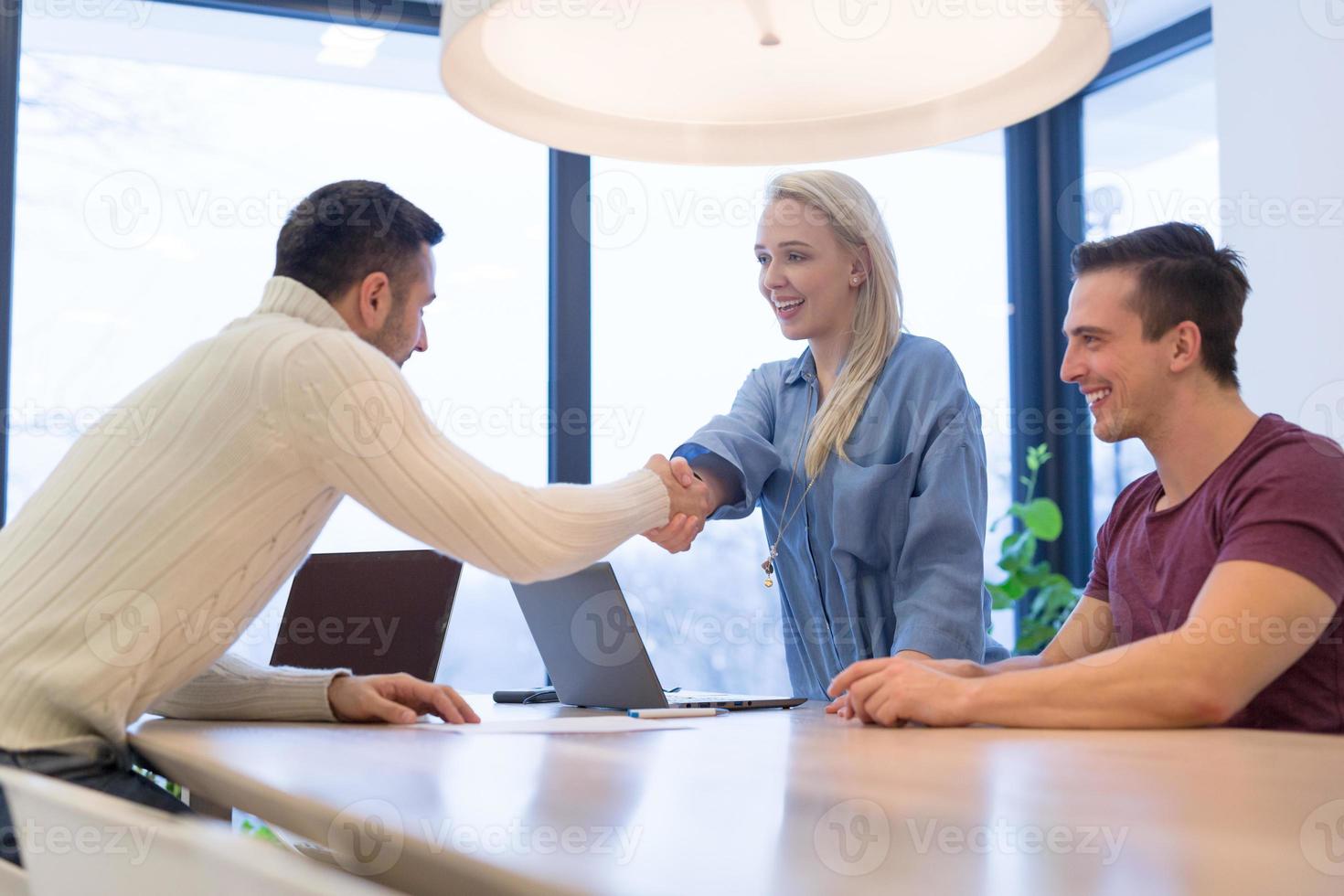 Startup Business Team At A Meeting at modern office building photo