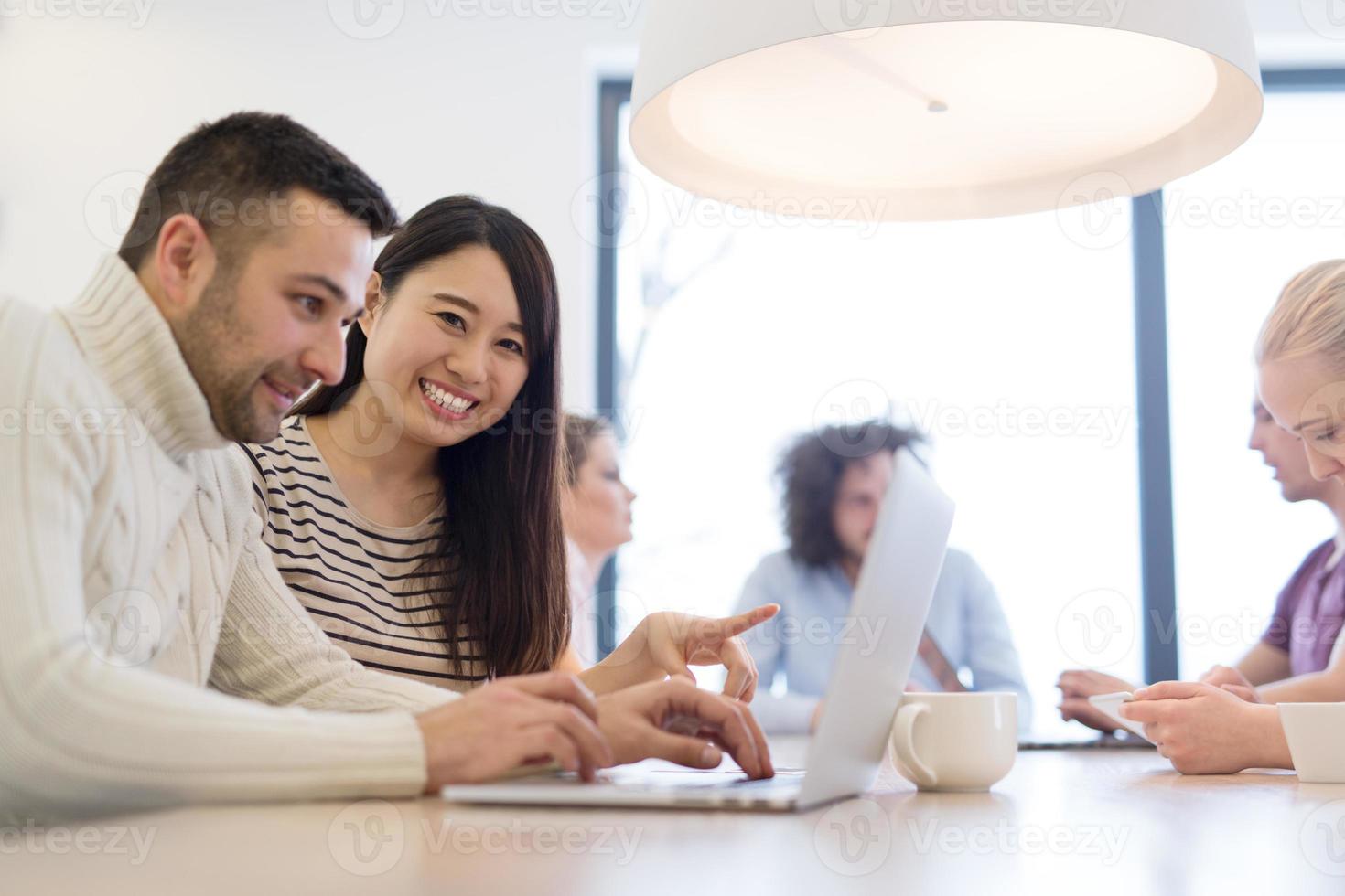 Startup Business Team At A Meeting at modern office building photo