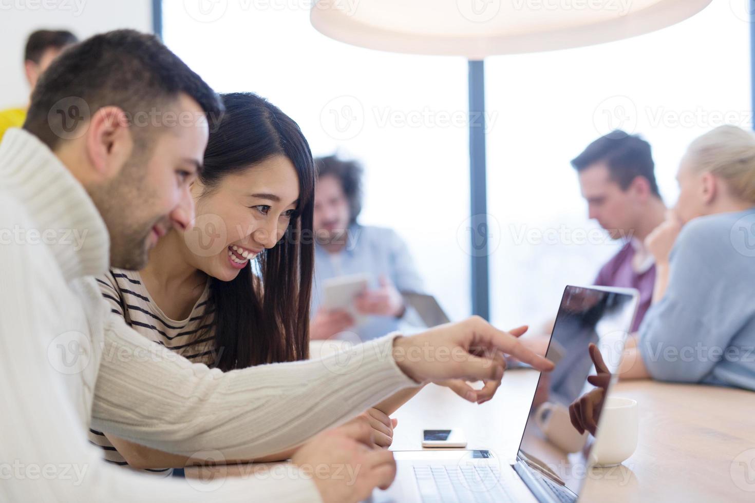 Startup Business Team At A Meeting at modern office building photo