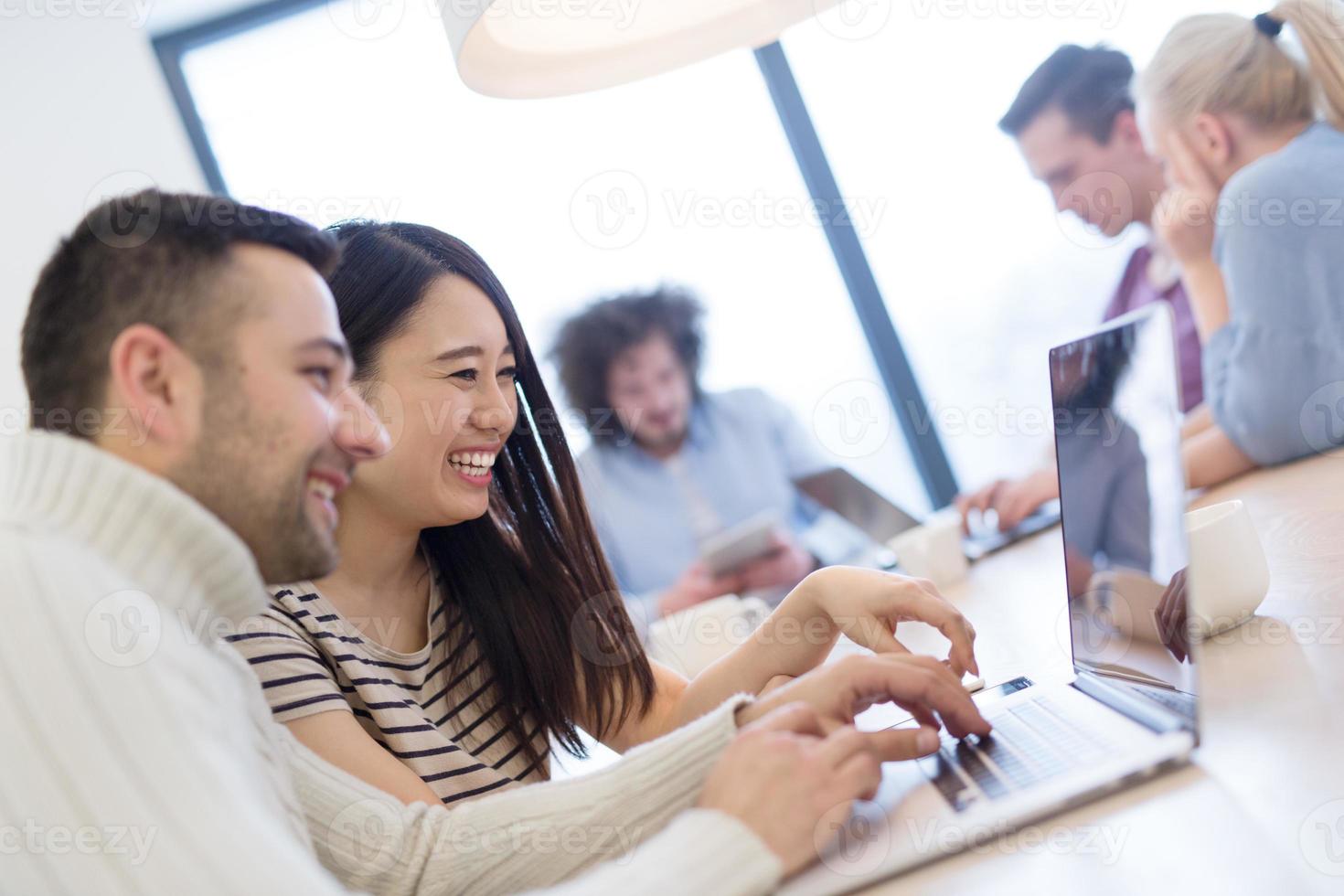 Startup Business Team At A Meeting at modern office building photo