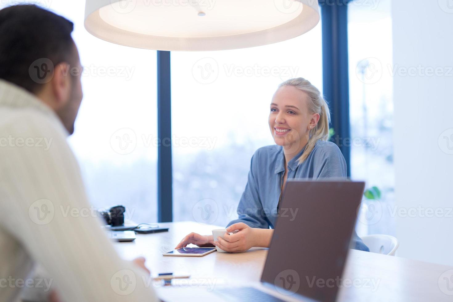 Startup Business Team At A Meeting at modern office building photo