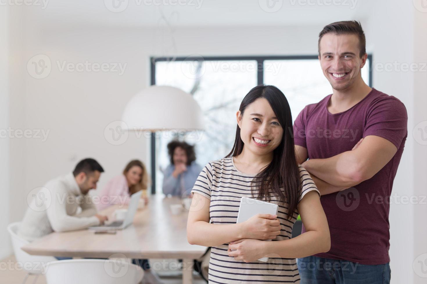 Startup Business Team At A Meeting at modern office building photo