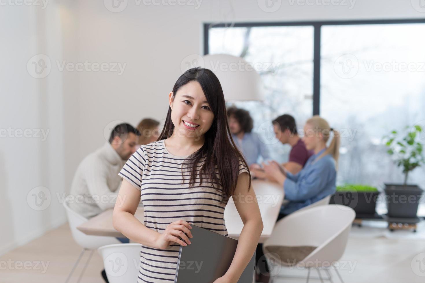 Startup Business Team At A Meeting at modern office building photo