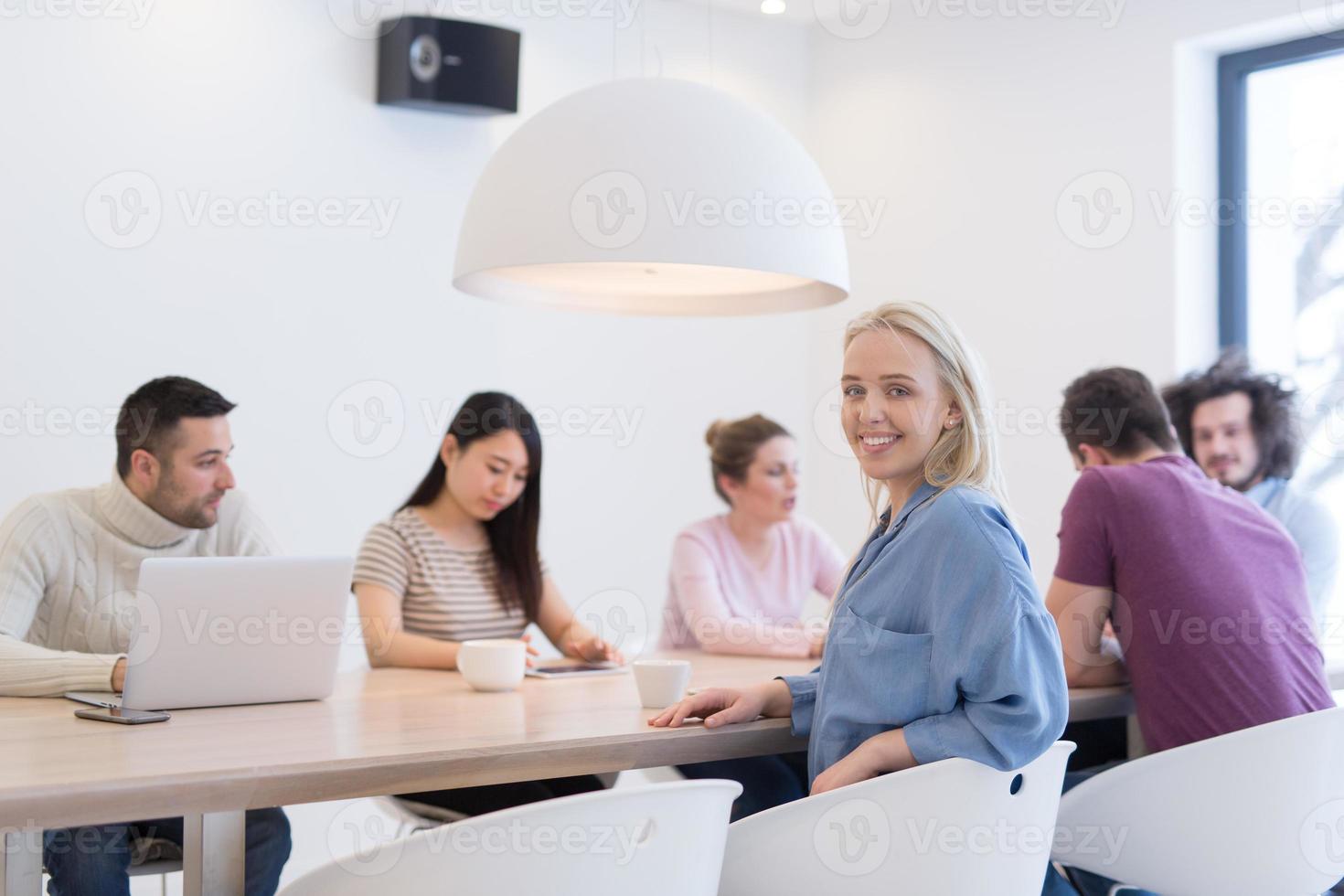 Startup Business Team At A Meeting at modern office building photo