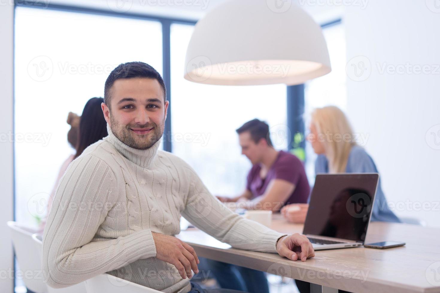 Startup Business Team At A Meeting at modern office building photo