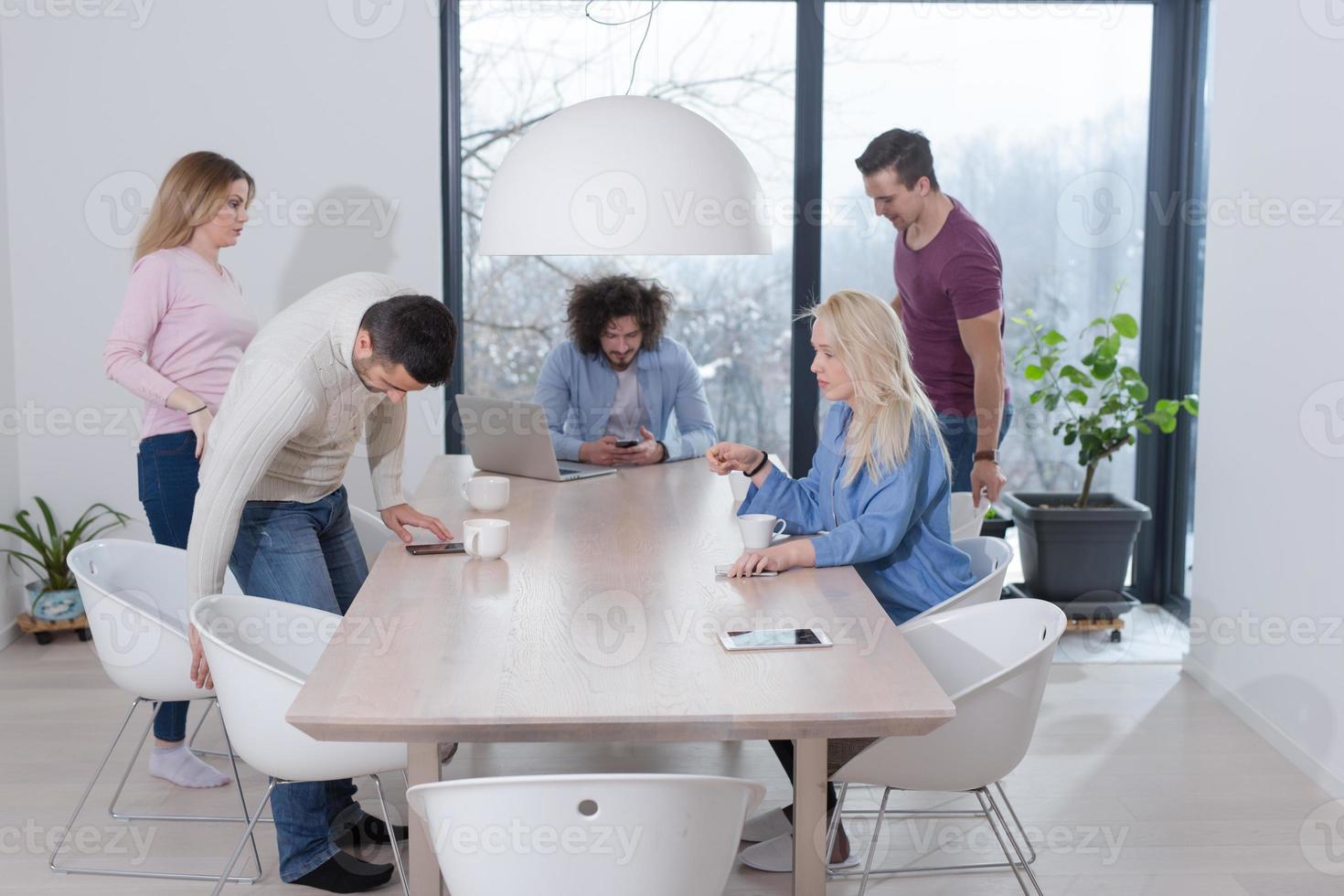 Startup Business Team At A Meeting at modern office building photo