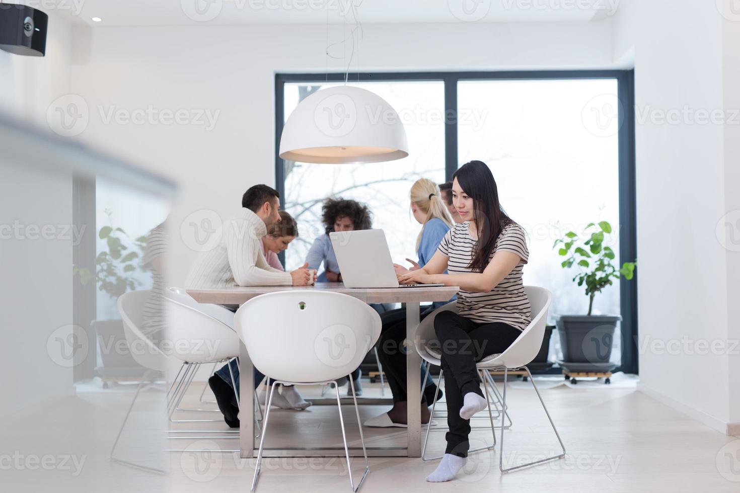 Startup Business Team At A Meeting at modern office building photo