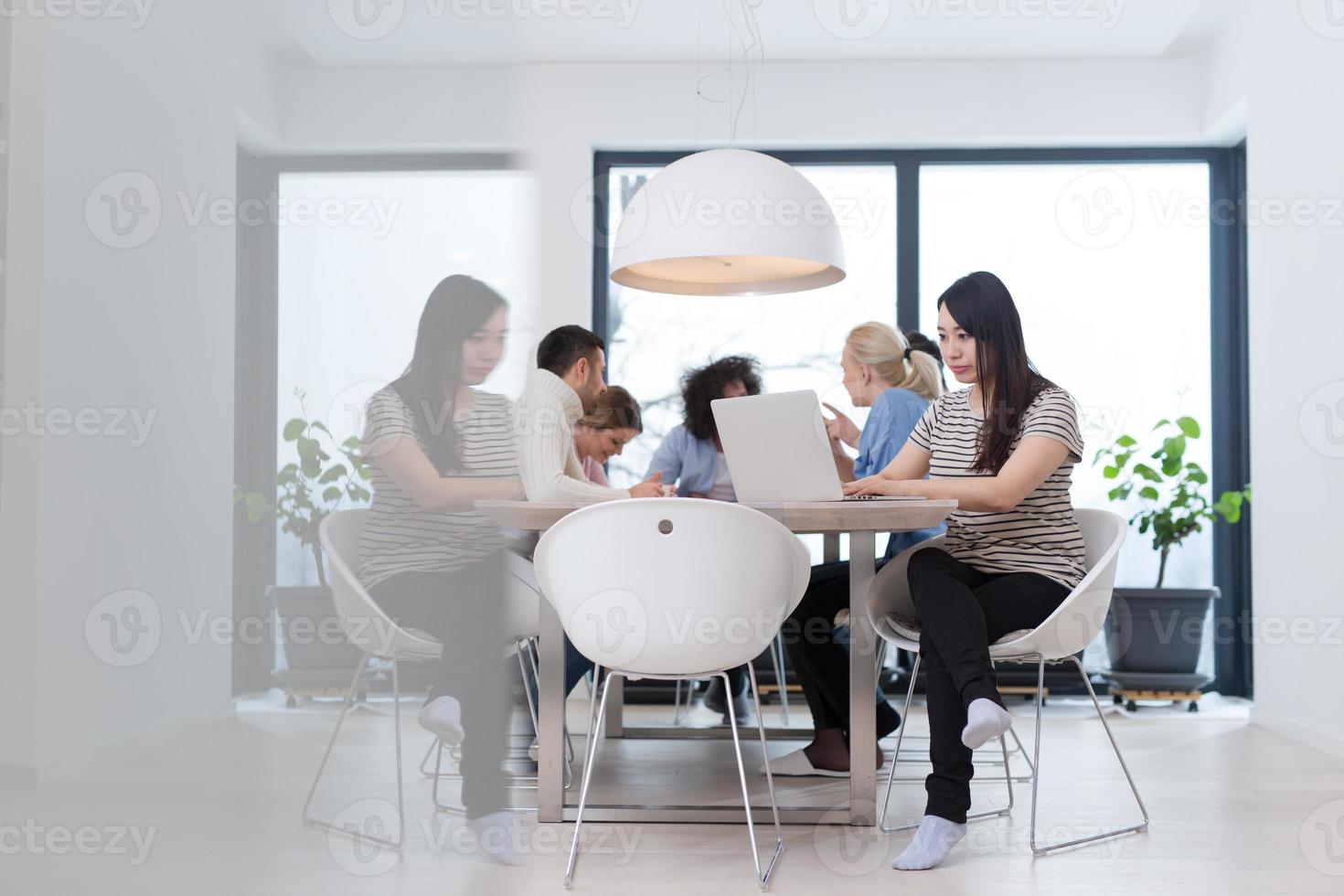Startup Business Team At A Meeting at modern office building photo