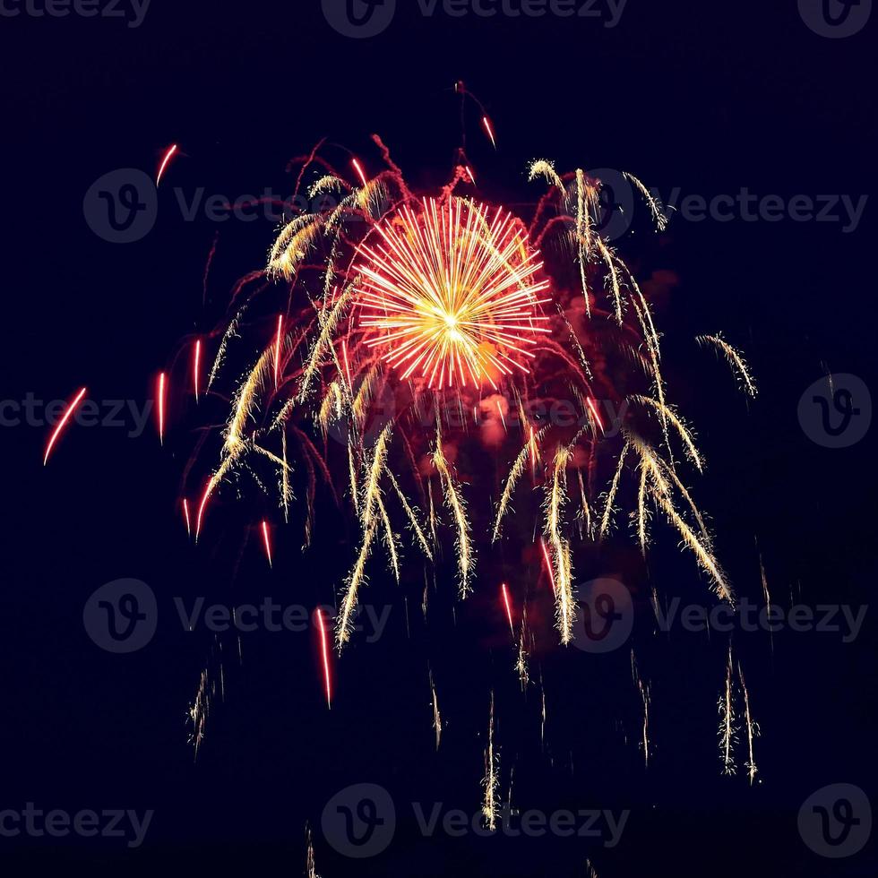 Sparks. Fireworks are a class of explosive pyrotechnic devices used for aesthetic and entertainment purposes. photo