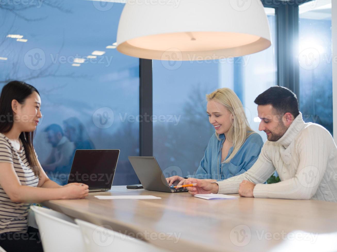 Startup business team at a meeting in modern office building photo