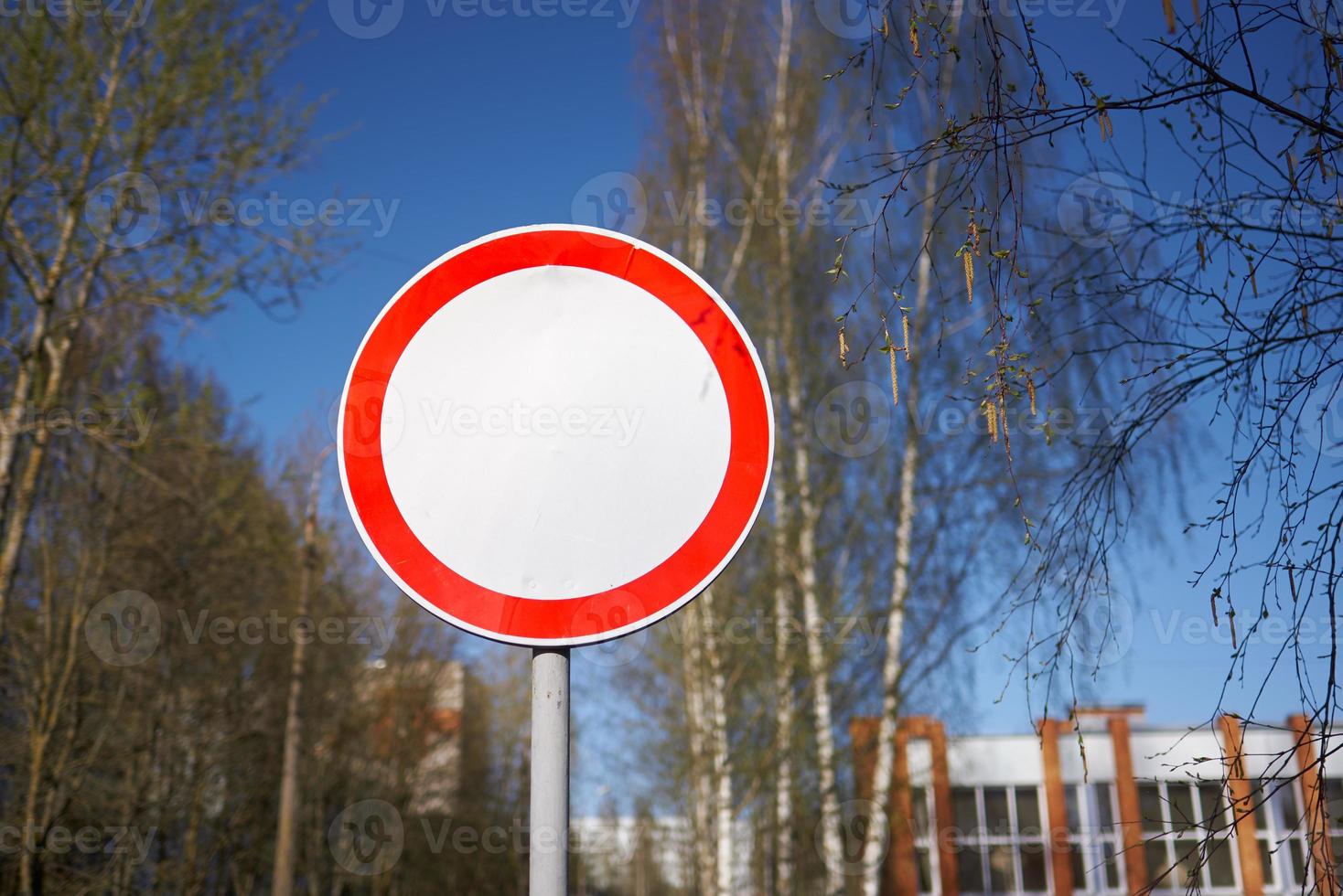 Traffic sign Movement prohibited against the background of the school building. photo