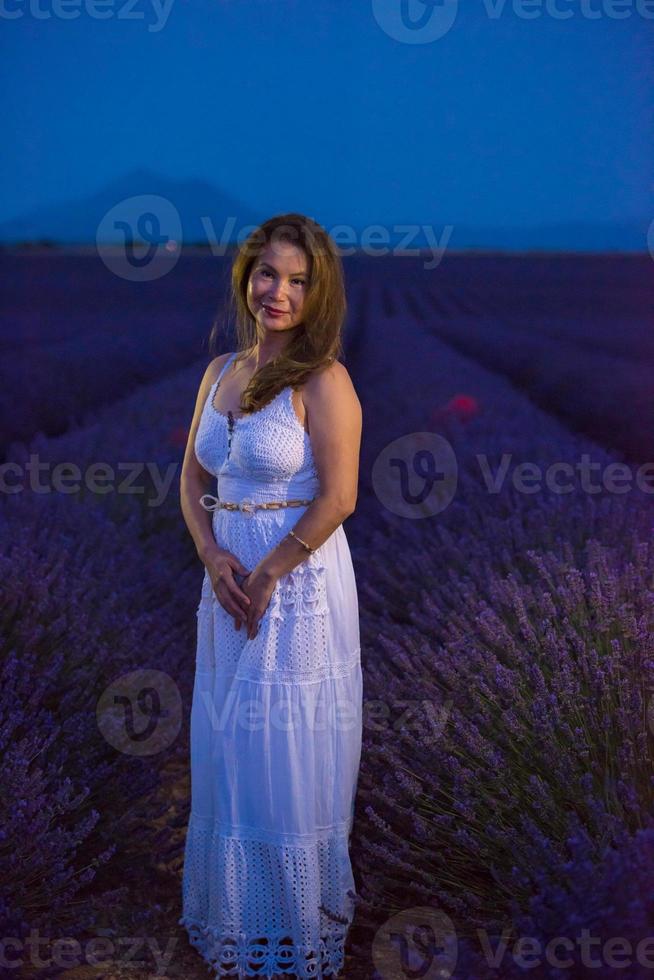 portrait of and asian woman in lavender flower field photo