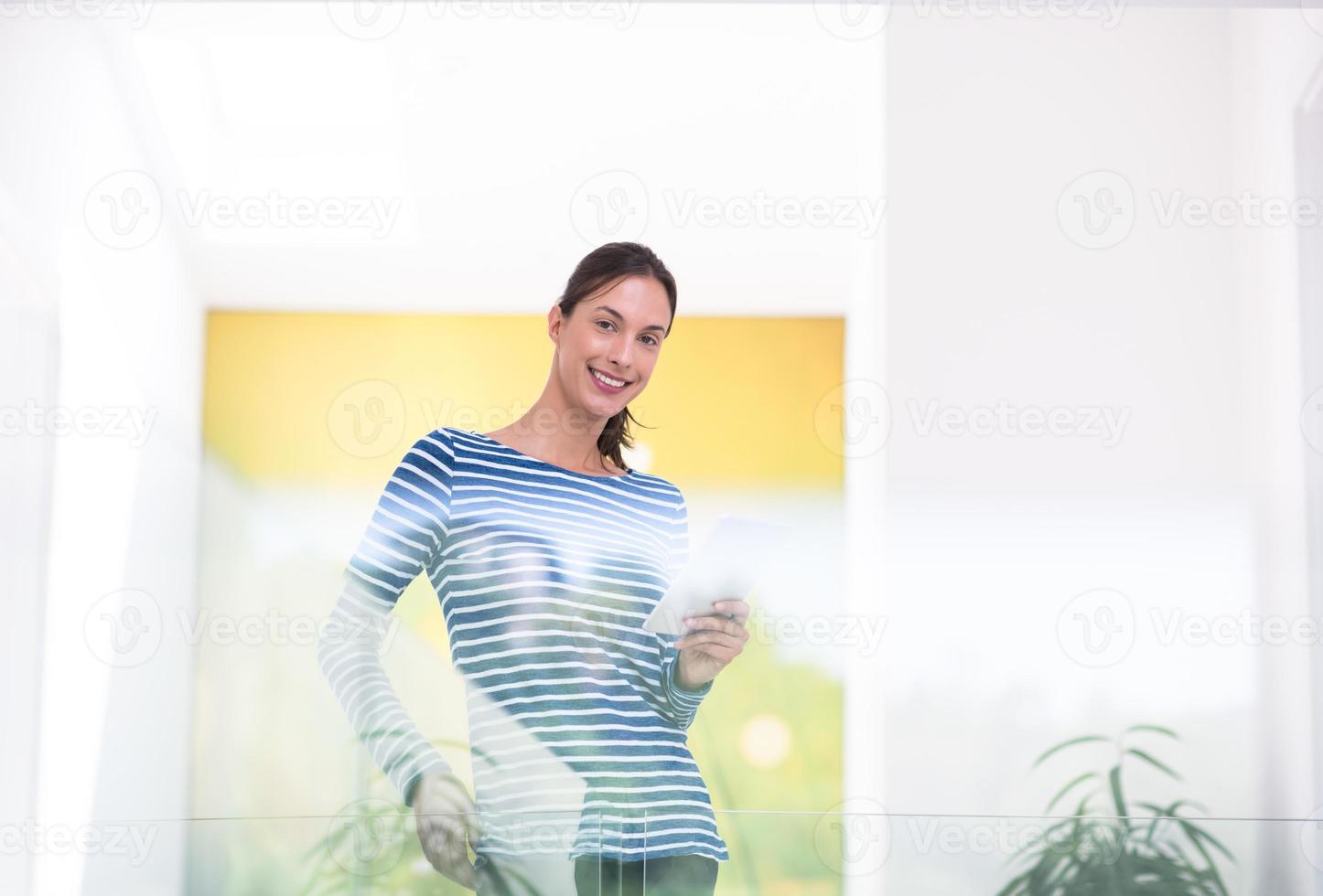 young woman at home websurfing photo