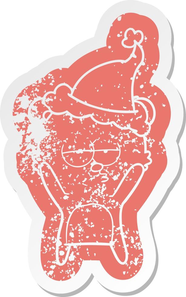 bored bear cartoon distressed sticker of a wearing santa hat vector