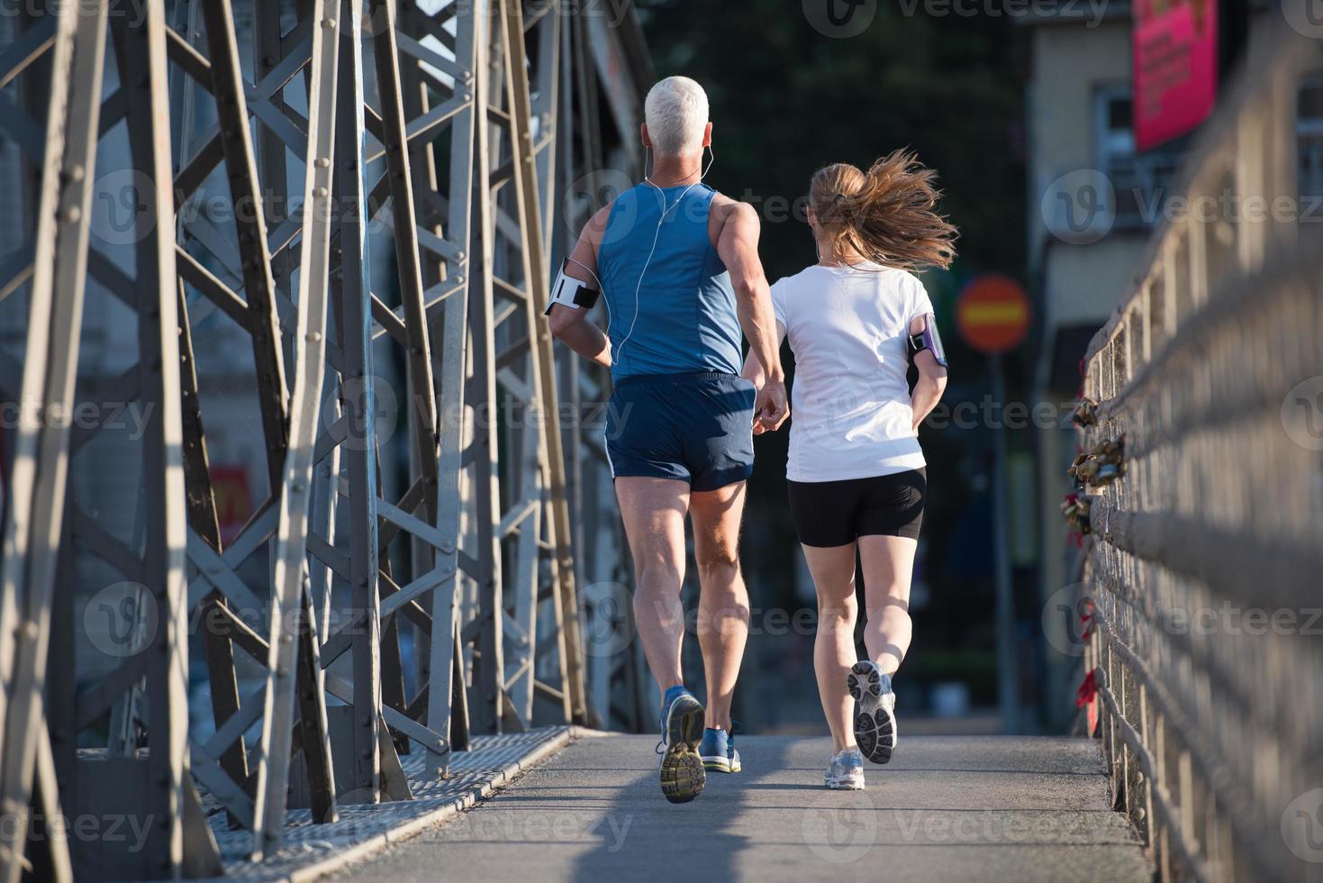 Couple jogging outside photo