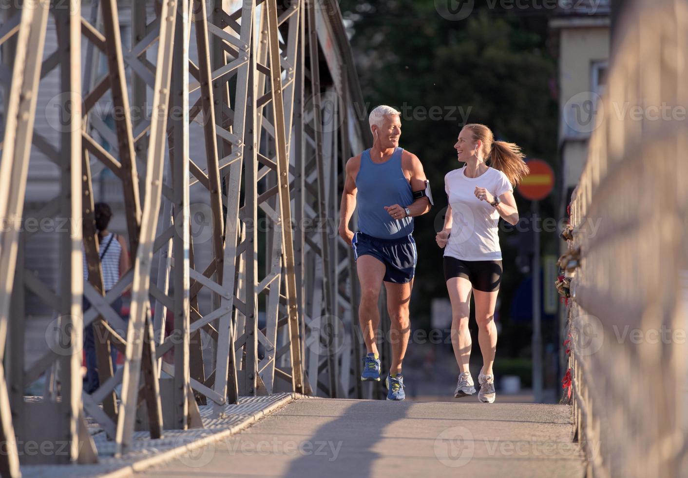 Couple jogging outside photo