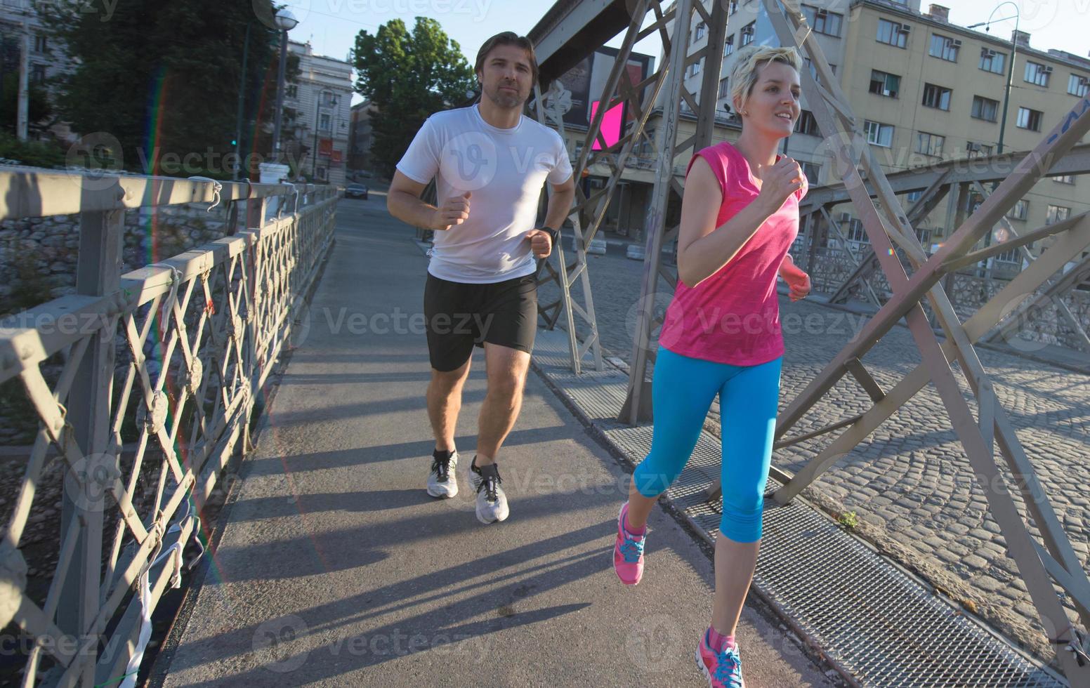 Couple jogging outside photo