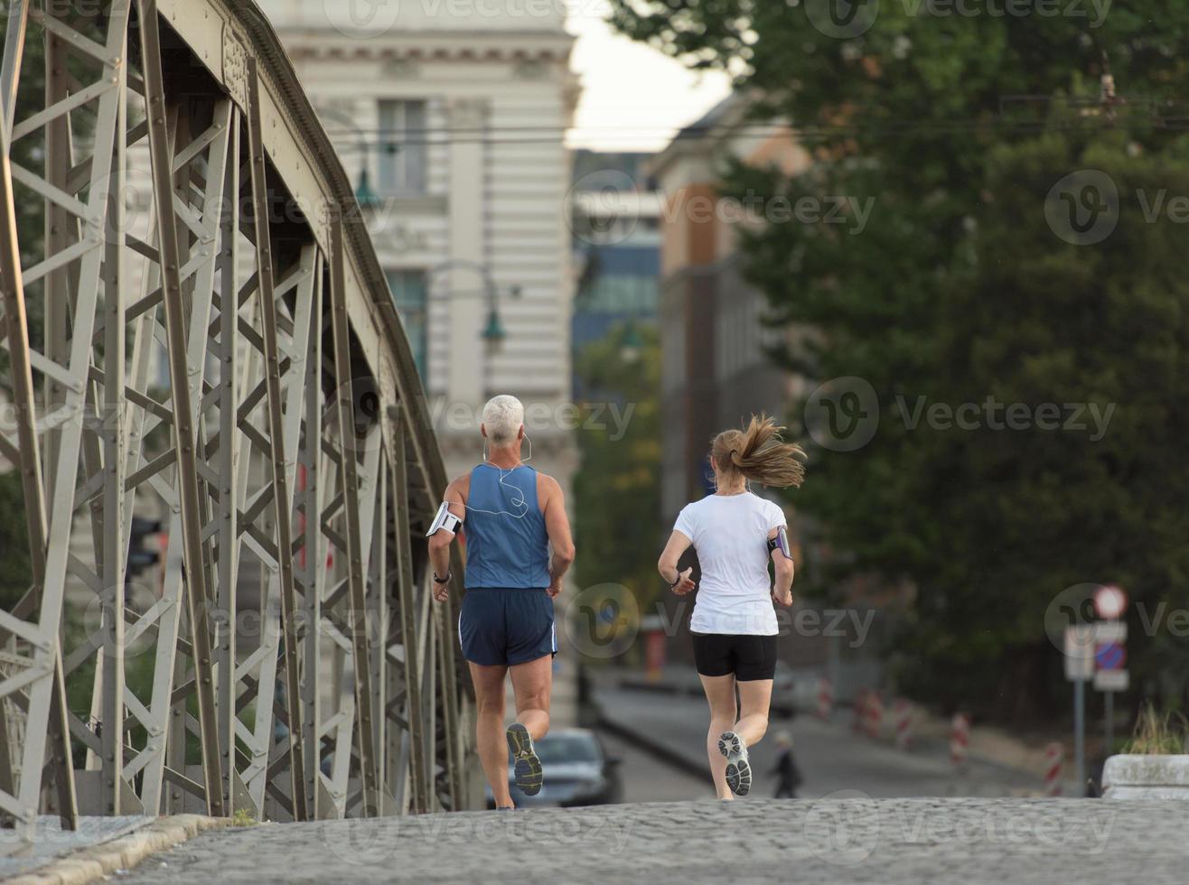 Couple jogging outside photo