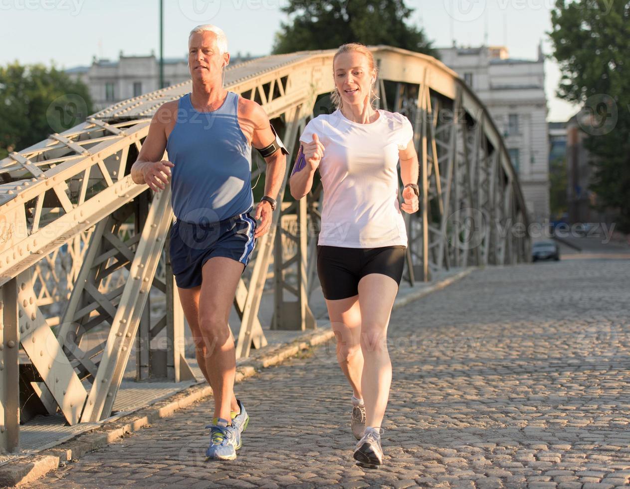 Couple jogging outside photo