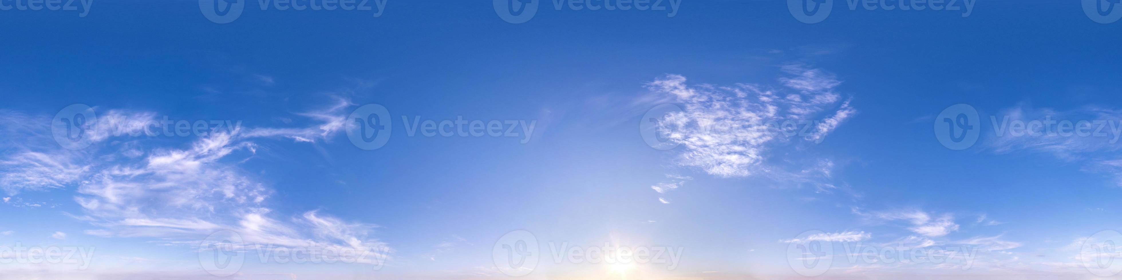 Seamless hdri panorama 360 degrees angle view blue clear evening sky before sunset  for use in 3d graphics or game development as sky dome or edit drone shot photo