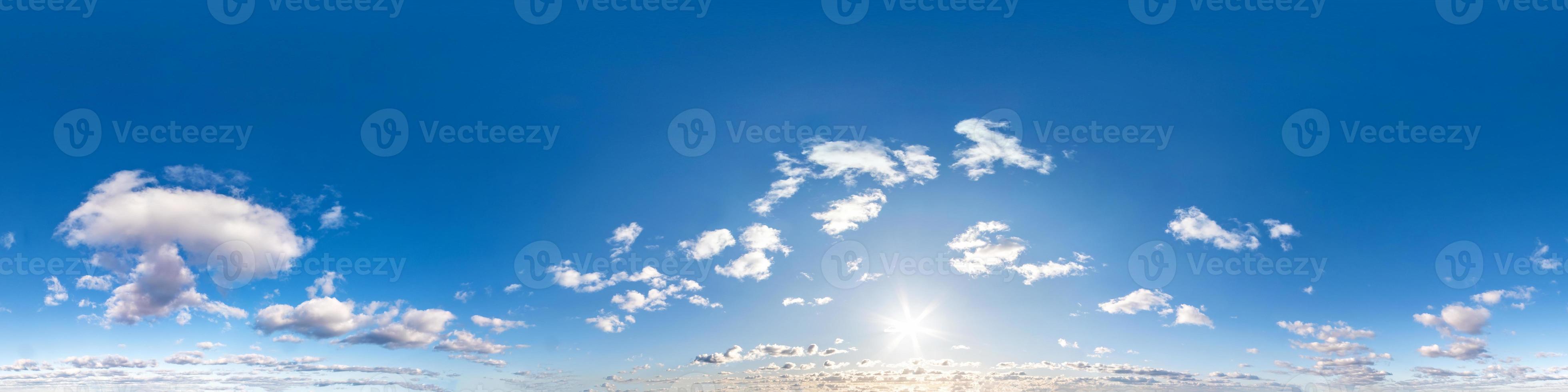 Seamless hdri panorama 360 degrees angle view blue sky with beautiful fluffy cumulus clouds with zenith for use in 3d graphics or game development as sky dome or edit drone shot photo