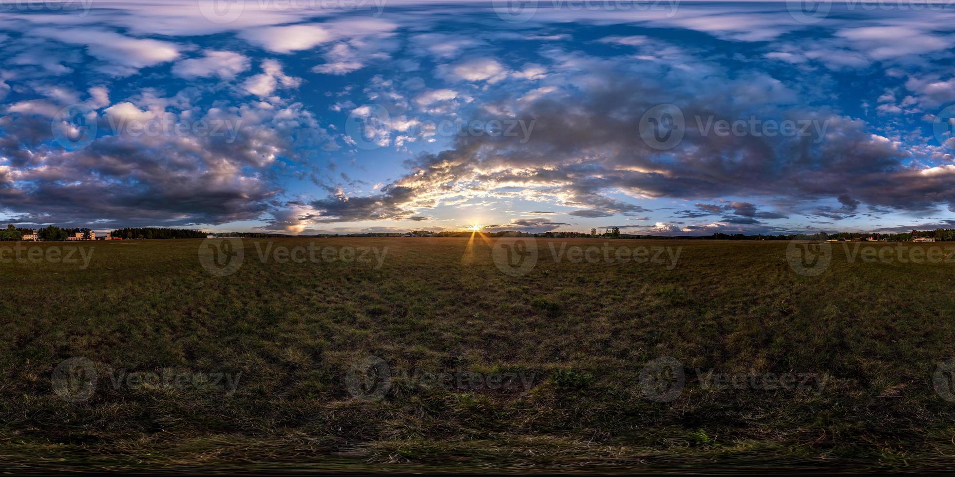 full seamless spherical hdri panorama 360 degrees angle view among fields in summer evening sunset with beautiful clouds in equirectangular projection, ready for VR AR virtual reality photo