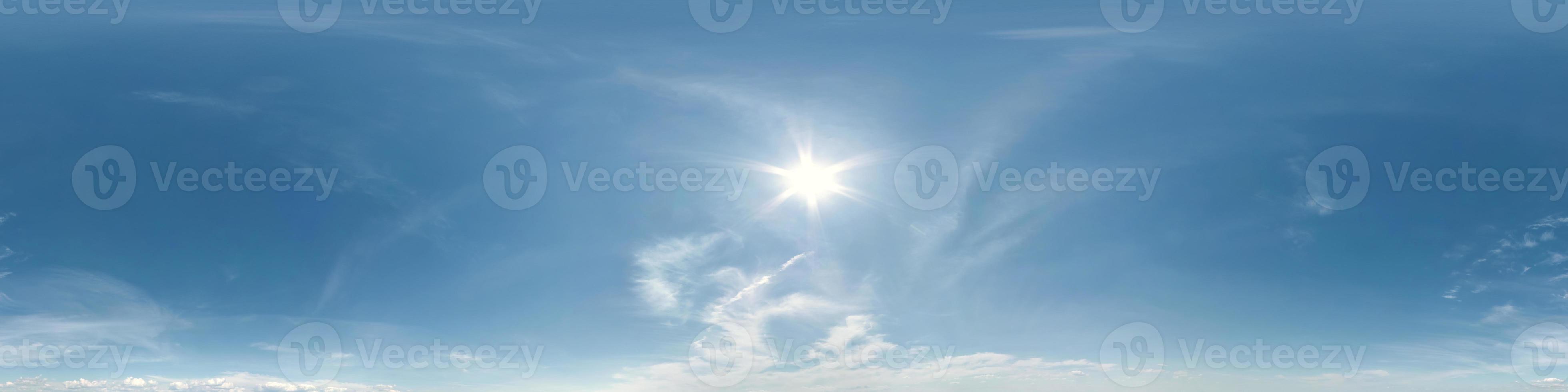 blue clear sky with beautiful fluffy clouds without ground. Seamless hdri panorama 360 degrees angle view without ground for use in 3d graphics or game development as sky dome or edit drone shot photo