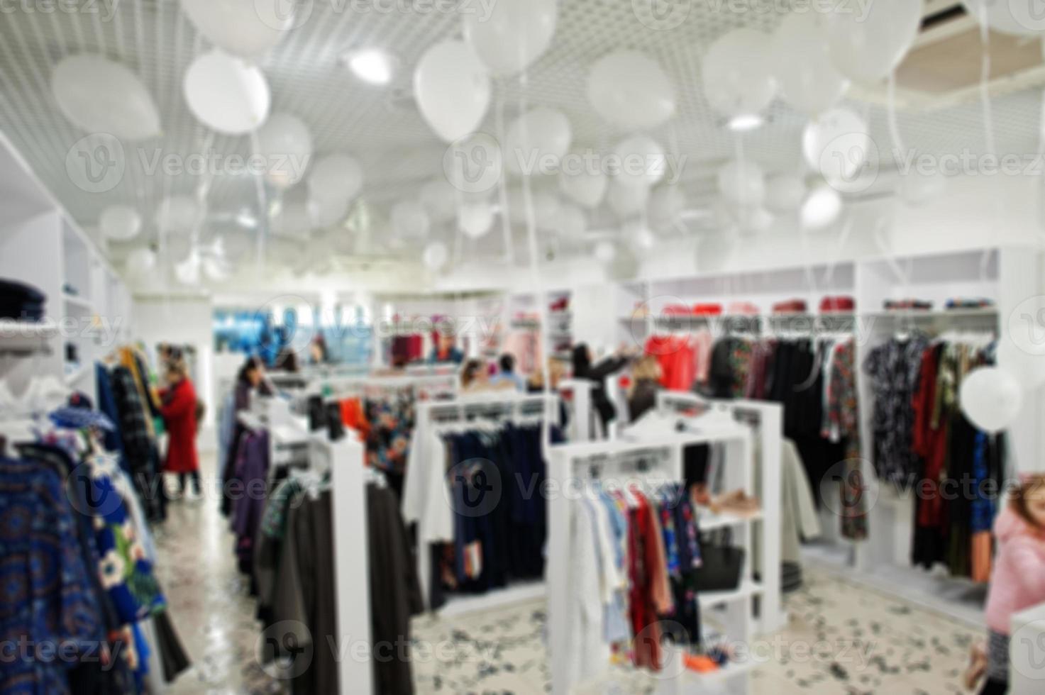 Blurred or defocused background of clothing store boutique. photo